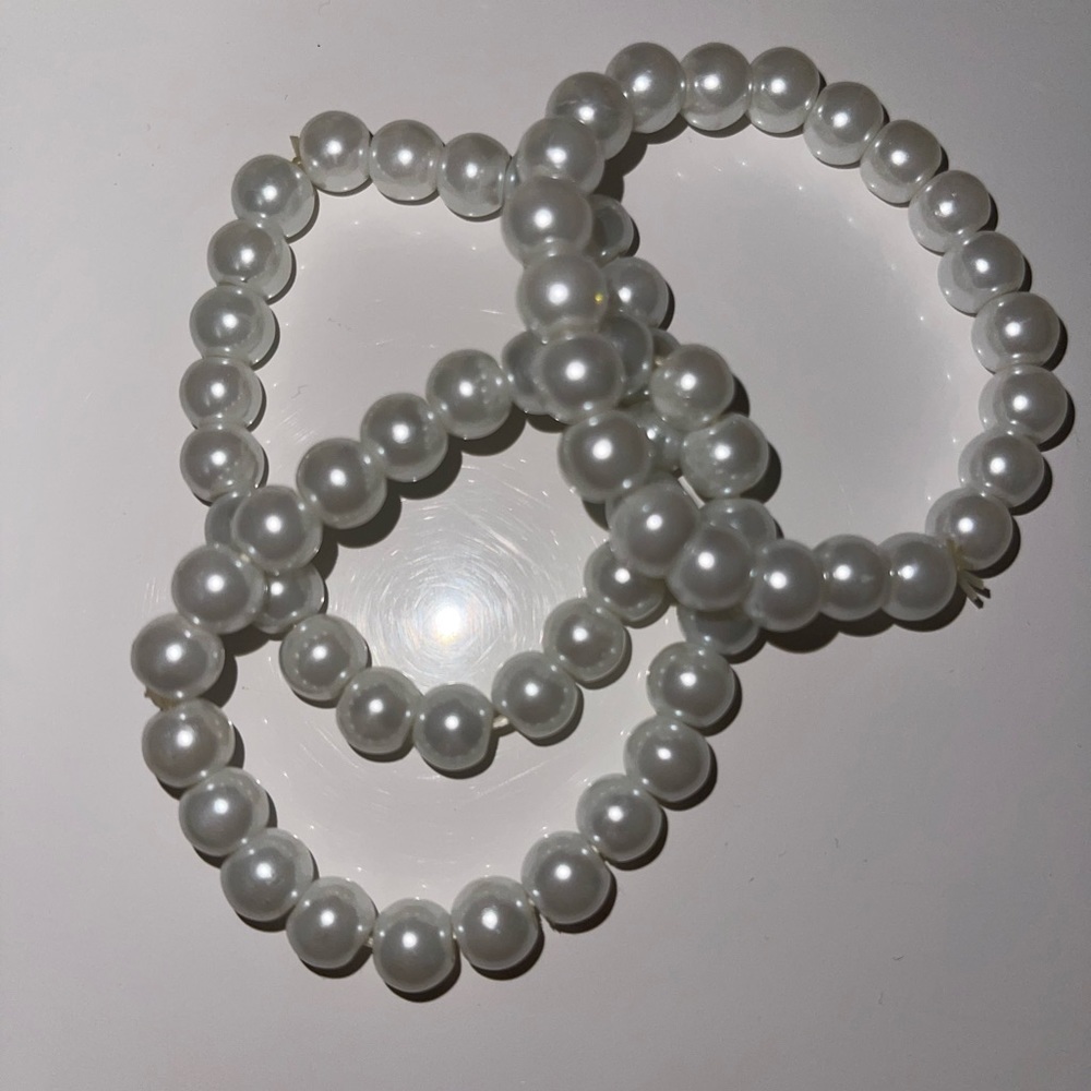 White bracelets great condition